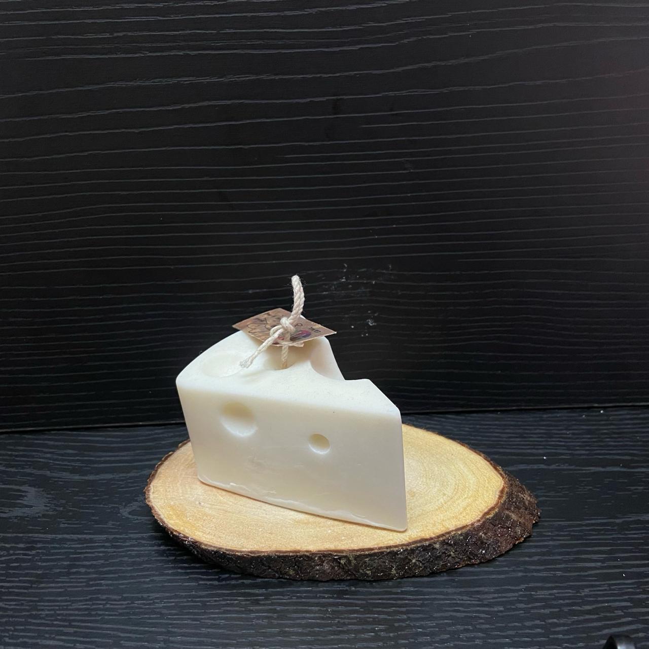 VELA CUARTO DE QUESO COMIDO 116